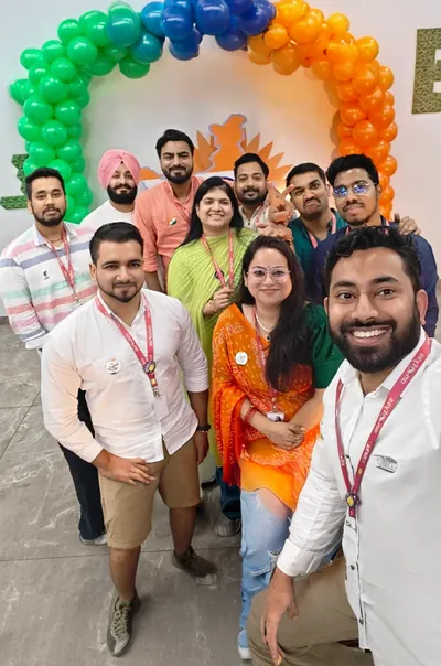 Colleagues marking a national day celebration at the office
